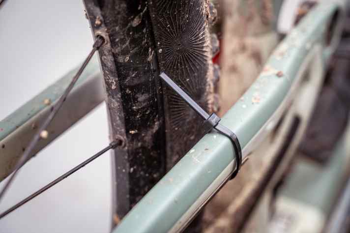 With a cable tie on the seat stays, you can at least roughly check your wheel for concentricity. Of course, you can be more precise with a truing stand.