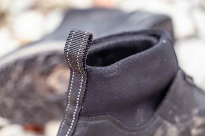 The finger loop helps you get in. The Gaerne opens wide, making it easy to slip in