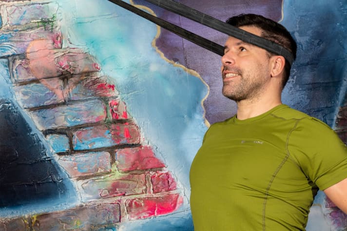 Strengthening and stretching the postural muscle during the "neck pull" exercise.