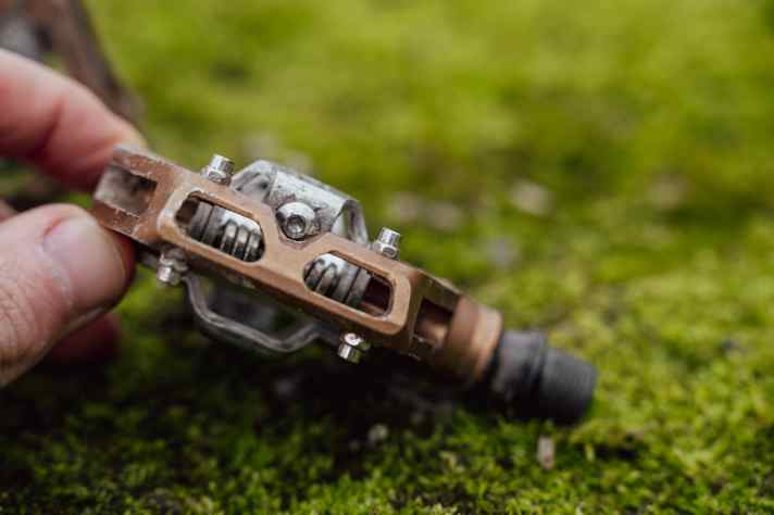 A small recess in the pedal body makes the adjustment screw easier to reach.