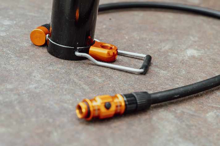 The Lezyne rests on the ground when pumping. A small folding foot provides additional stability