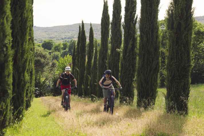 Not all trails in Umbria and Tuscany are flanked by cypress trees. The vast majority are much wilder and more fun.