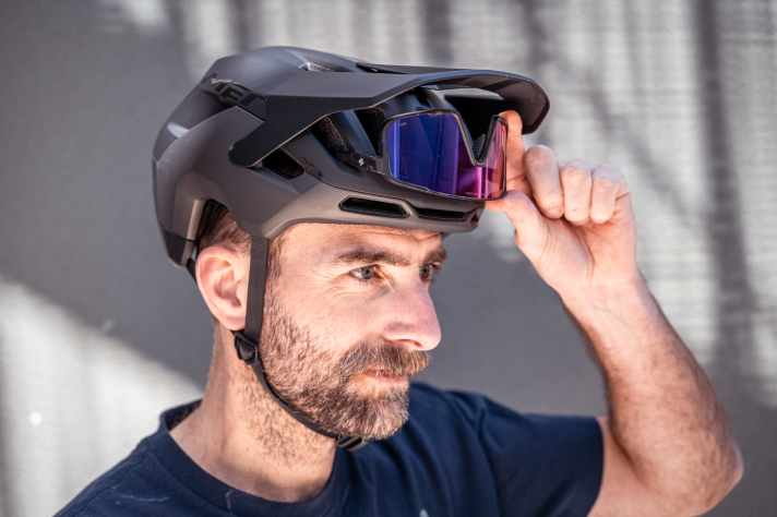 The visor adjustment is not very well defined. However, there is space under the visor for both sunglasses and goggles