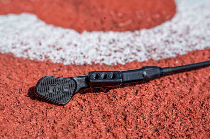 Three holes provide lateral clearance on the handlebars