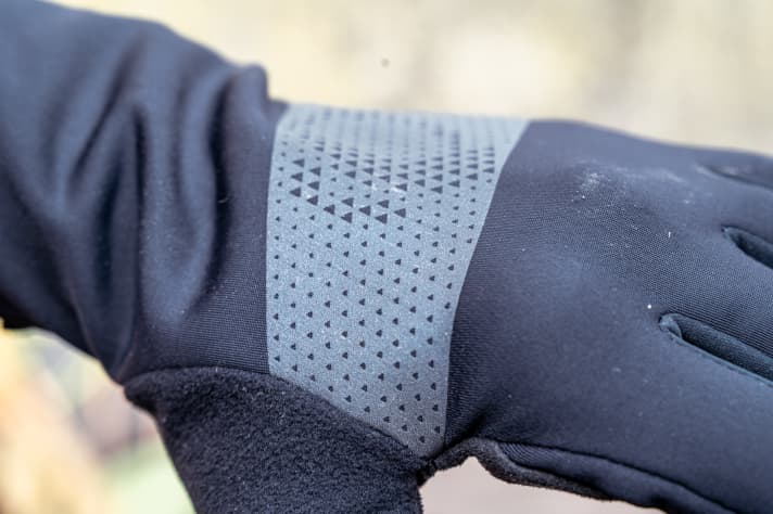 The reflective bar provides visibility, but is too tight and inflexible