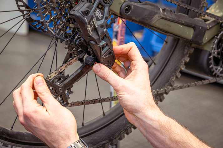 If you are in the adjustment mode, you should be able to click the cage into the setup position without any major movement.