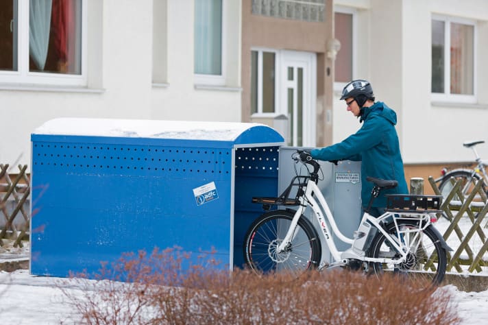 Bike garage: Pedelecs are parked safely and dryly in a bike box made of sheet steel.
