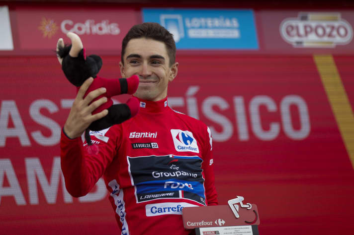 Lenny Martinez in the overall leader's red jersey at the 2023 Vuelta a Espana.