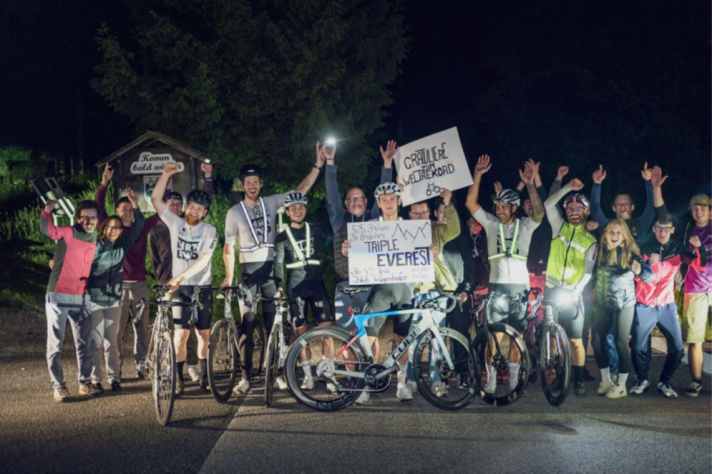 Helpers and supporters celebrate his success with Jakob Wagenhofer