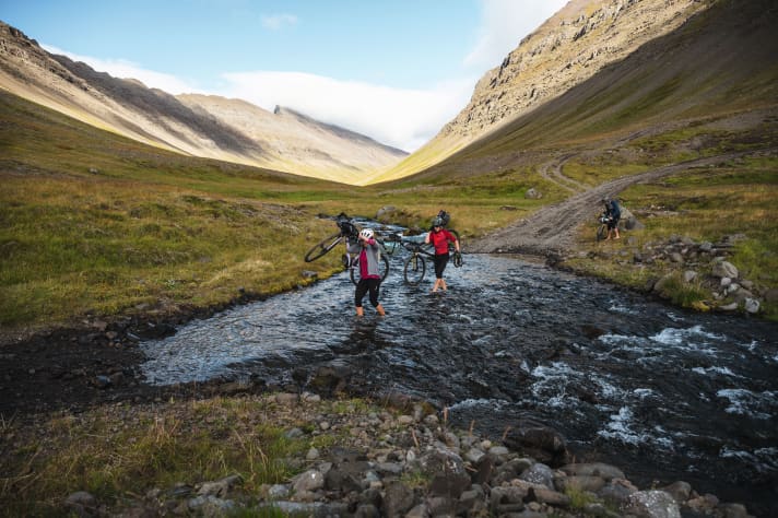 Shoes and socks off, bike shouldered and off you go! After the umpteenth stream crossing, the handholds are in place