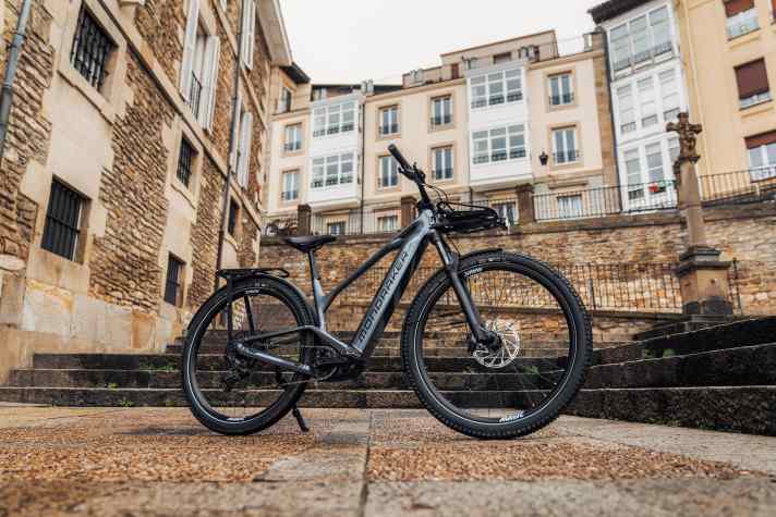 The Mondraker Prime X comes with pannier racks at the front and rear, plus a complete lighting system, mudguards and a kickstand.