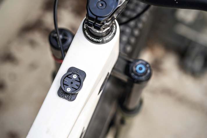 The Flex Mount Base is simply glued onto the top tube