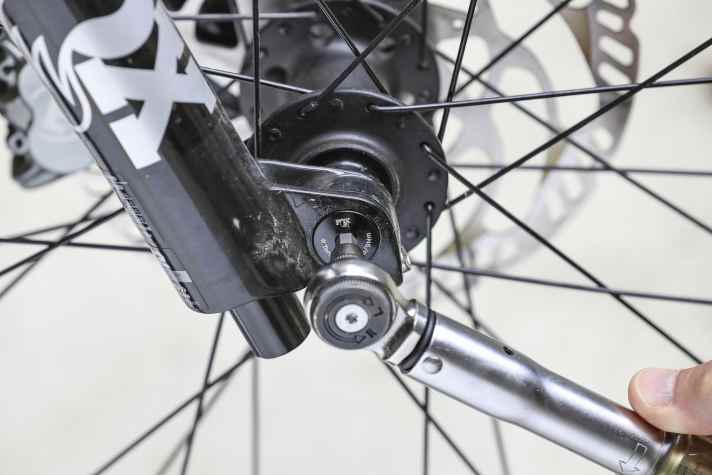 The correct torque is best set in the workshop using a torque spanner