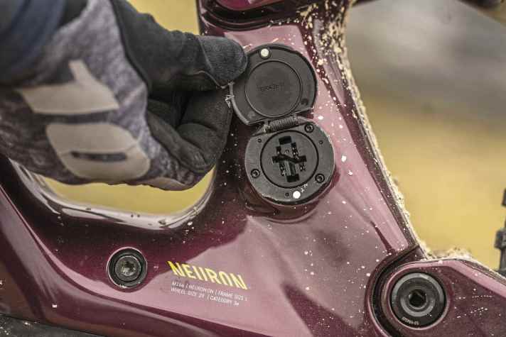 The charging port closes magnetically.