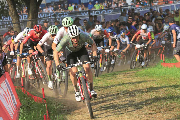Luca Schwarzbauer leads the pro field in the cross country short track race.