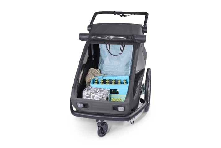 With the Yuuna trailer from Croozer, the seats can be removed in just a few simple steps to create a continuous loading area with a high transport volume. | pd-f