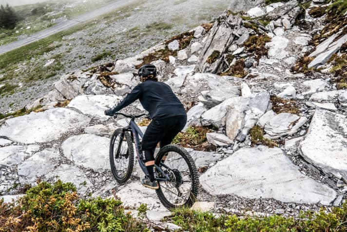 The upper part of the Segnes Trail features natural rocks.