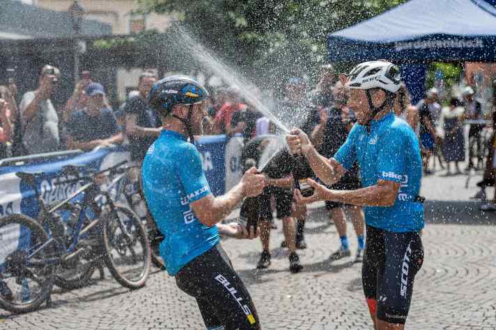 Champagne shower for Karl Platt and Calle Friberg from Team Bulls Legends. This is Karl Platt's tenth victory out of 20 participations in the Maxxis BIKE Transalp.