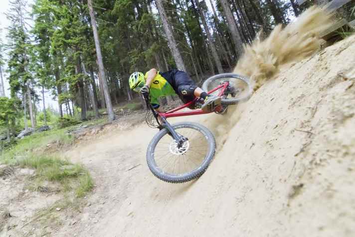 Trail-builders' terror: hit the bend with a bang and the berm crumbles.