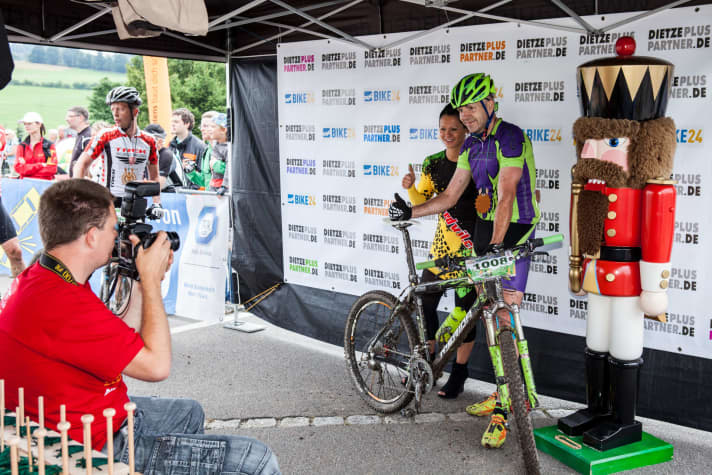   A finish line photo with nutcrackers and finisher girls: an EBM tradition.