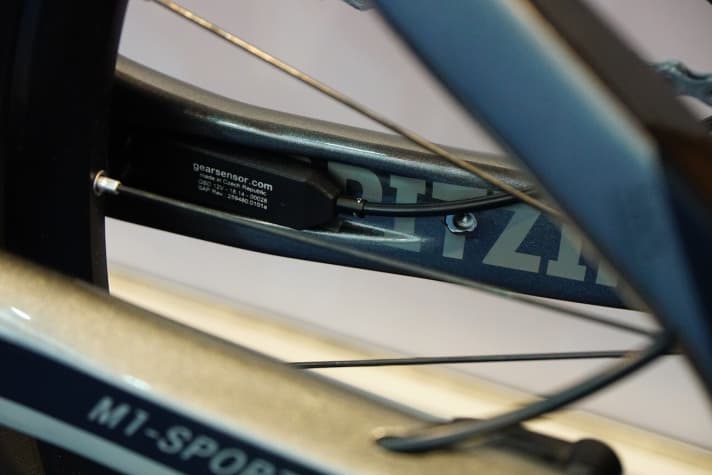   Spitzing relies on a gearshift sensor that takes away the engine power for a fraction of a second during the gearshift process. This is intended to make shifting smoother and protect the drivetrain.