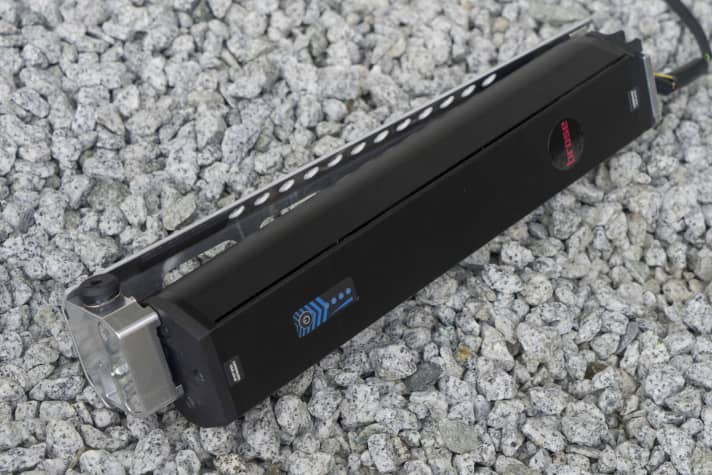   The battery sits in a patented aluminium holder that is completely recessed into the manufacturer's down tubes. This should make problems with frame tolerances less problematic and ensure a firm and rattle-free fit.