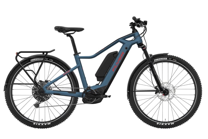   Das Goroc 1 mit Bosch-Motor ist ein Mountainbike-Hardtail mit Gepäckträger und Schutzblechen. Dank des längeren Federwegs und der Maxxis Forekaster-Bereifung sollte es sich aber auch auf Trailausflügen wohlfühlen. Erhältlich auch als S-Pedelec.