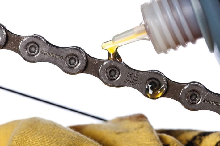   Clean the chain first, then oil it!