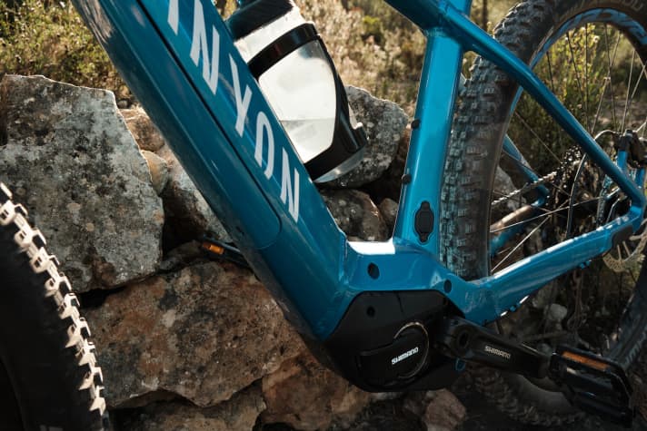   There is space for two water bottles in the frame triangle and the charging port for charging the battery in the frame is located above the motor.