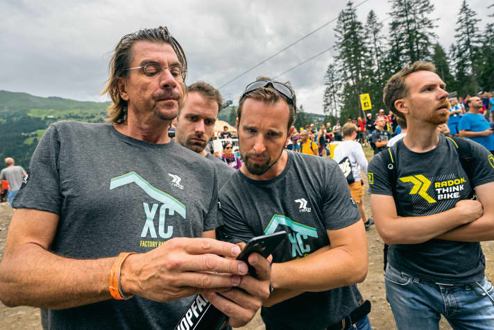   Always on display: Stahl constantly checks the position of his team riders.