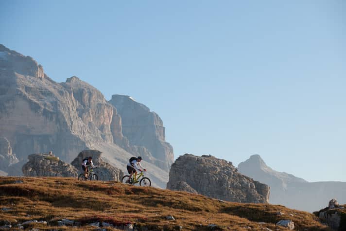   After the ascent from Campiglio, the route leads through treeless high pastures.
