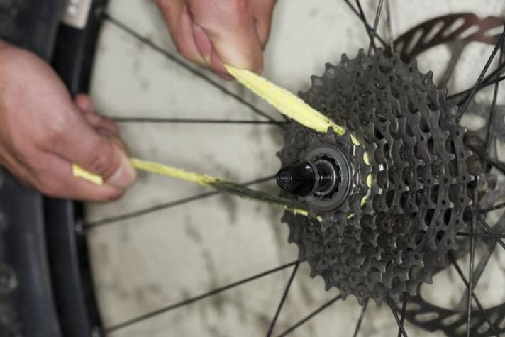   Spaces: Remove the coarse dirt with a brush. Then the dental floss: Pull a strip of cloth (one centimetre wide) through the sprocket until the inner spaces are shiny.