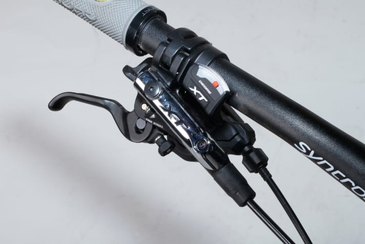   Great ergonomics, great function. Shimano's new XT groupset with 2-way release is always the right choice.