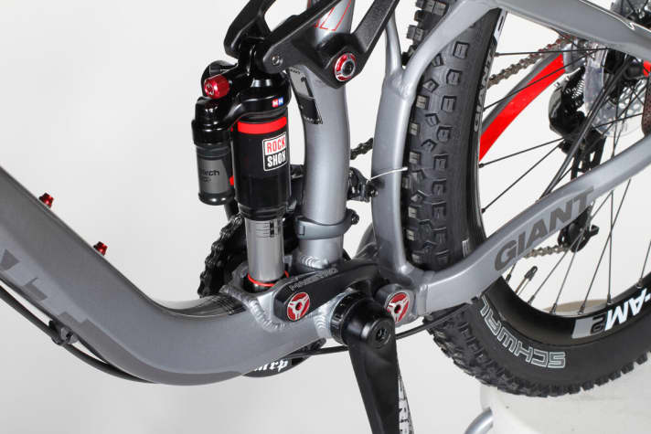   The rear suspension works very well in principle, but the shock lacks a platform or lockout for climbing. It sags deeply on the climbs.