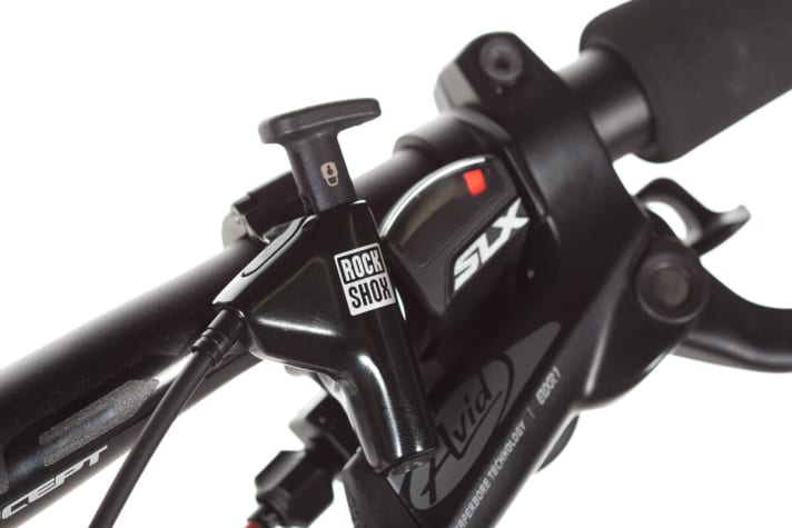   All bikes have remote controls with which you can lock the fork from the handlebars. The Pushloc convinced us the most.