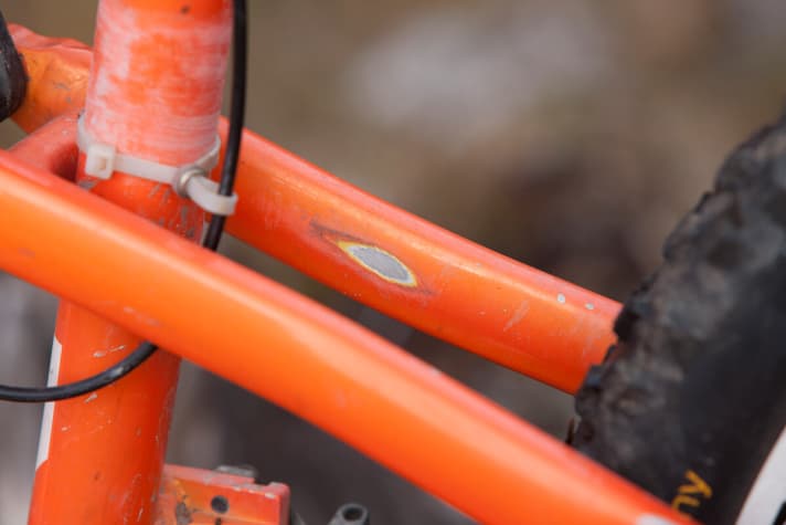   Scars of a lottery life: paint chips and scratches adorn the entire Beef Cake frame.