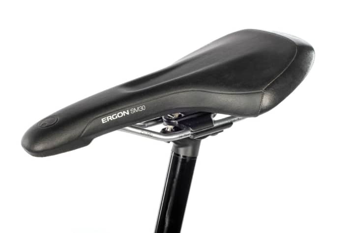   Canyon and Votec fit the very comfortable Topeak Ergon SM 30 saddle ex works, and there are also comfortable Ergon screw-on grips.