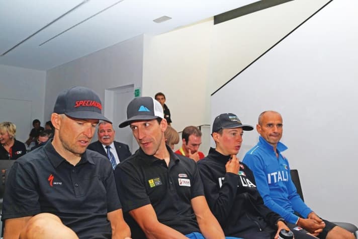   Pretty much the best competitors: The top favourites Christoph Sauser and Alban Lakata having a nice chat at the press conference.