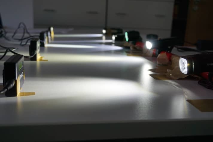 The lamps run at the highest level, the photocells provide information as to whether the light output drops.