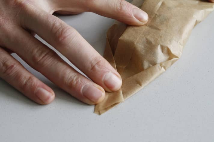   Now fold the edges into a triangular shape...