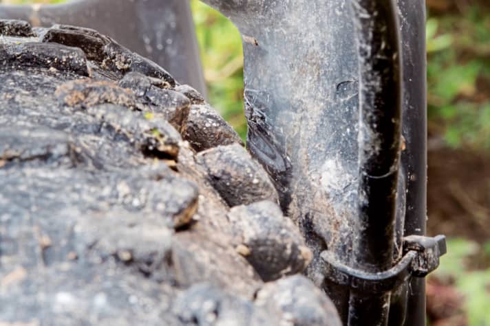   Scott Genius LT 700 Tuned: Visibly scratched - low tyre clearance and flex in the carbon rear triangle leave unsightly marks. It's only a matter of time before the chainstay gives up. Points deducted for durability.
