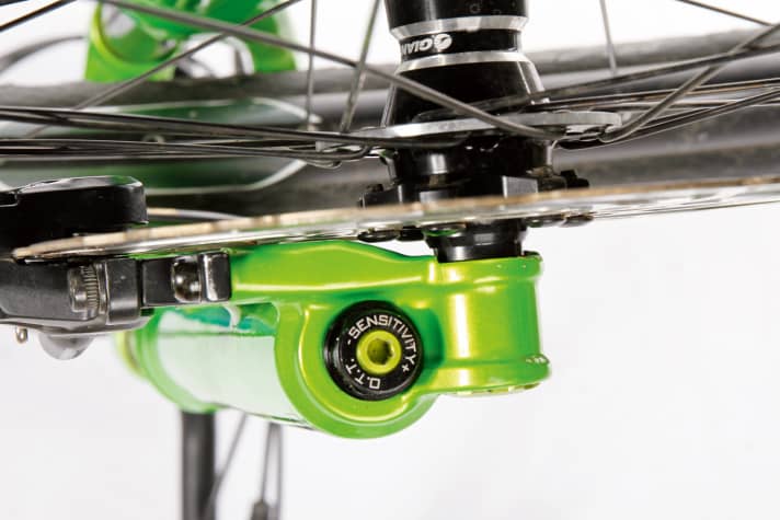   - DVO:  The space between the brake disc bolts and the casting is pretty tight. The O.T.T. adjustment supports the compression.