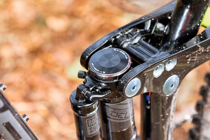   New shock with metric installation dimension and trunnion mount. The rebound adjustment is located on the large wheel on the top.