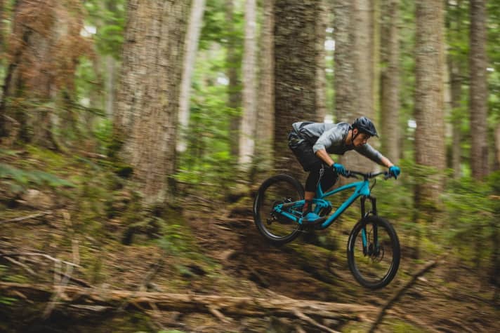   Full throttle and hop. The Process is in its element downhill, but the new bike should also pedal much better uphill.