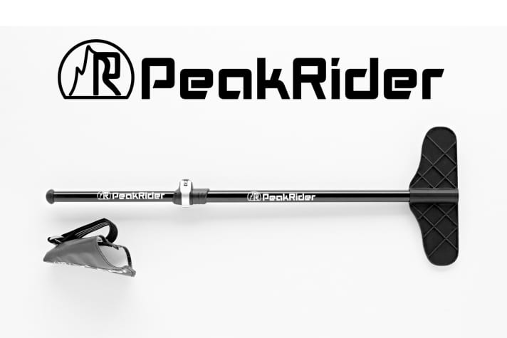   The system consists of the carrier bar, which is stowed in the backpack, and the matching holder for the frame.