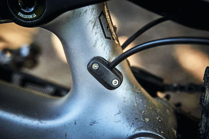   The cables run inside the main frame and are firmly clamped at the exit.