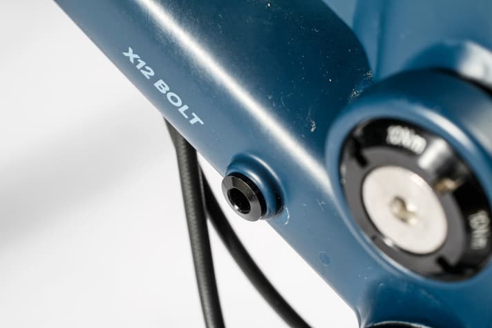   Votec VM Pro: The Votec has some clever details that make life easier for bikers. For example, there is a spare screw for the rear derailleur in the frame (pictured). A hole in the seat tube indicates the maximum saddle extension.    