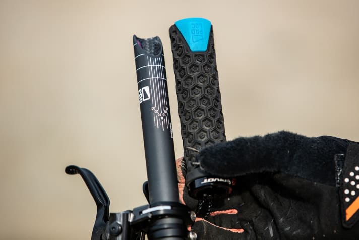   The Padloc grips, which require the handlebars to be bevelled, offer more comfort and protection against twisting.