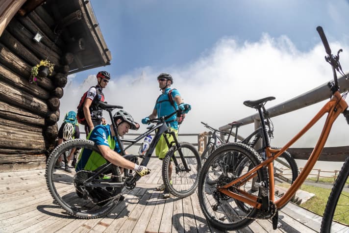   After a good 90-minute climb, the Baita Segantini is the perfect place to stop for refreshments. And an opportunity for us to swap bikes.