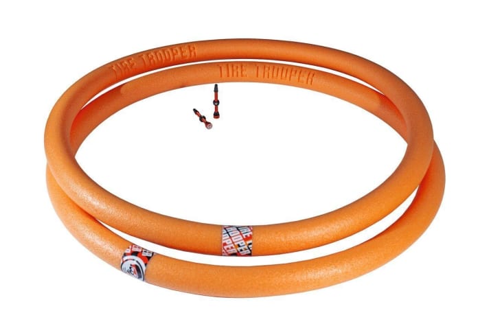   Looks like a Pool Noodle, but is made of a much more stable foam: the Tire Trooper.
